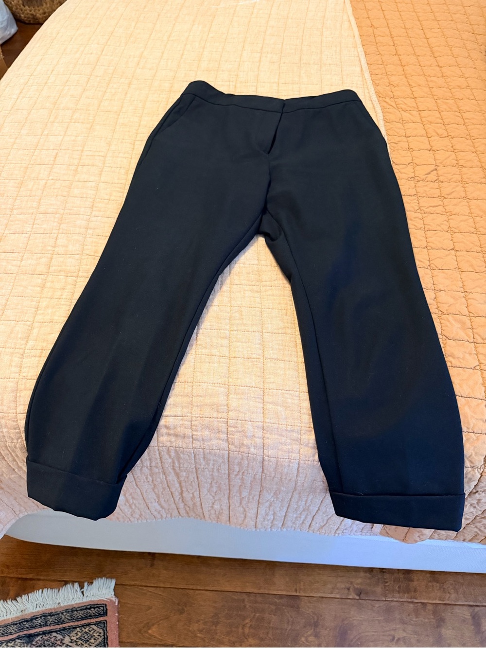 Women’s 10 Petite Ann Taylor Black Cuffed and Tapered Dress Pants.